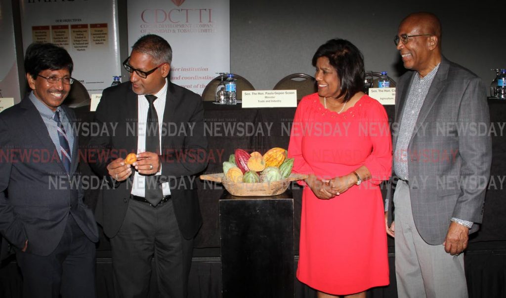 Cocoa Research Centre director, Prof Pathmanathan Umaharan, Agriculture Minister Clarence Rambharat, Foreign Affairs Minister Paula Gopee-Scoon and Cocoa Research Advisory Board chairman Winston Rudder, at the opening of the World Cocoa and Chocolate Day expo at the Hyatt Regency, Port of Spain last week.  PHOTO BY ANGELO M. MARCELLE