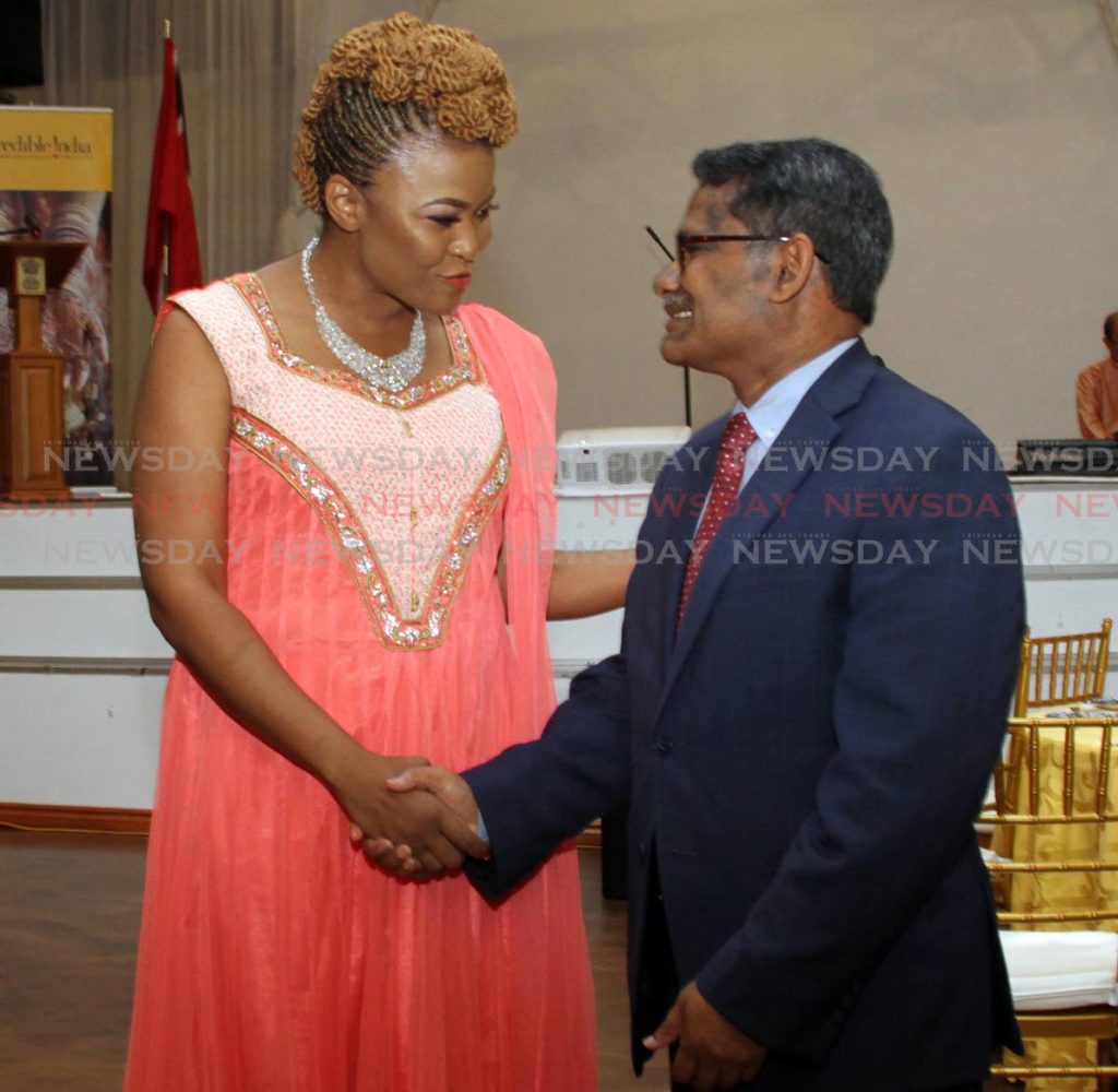 CLOSE TIES: Minister of Culture, Community Development and the Arts Dr Nyan Gadsby-Dolly is greeted by Indian High Commissioner to TT Arun Kumar Sahu at the Passage to Asia restaurant in Chaguanas on Saturday.  PHOTO BY VASHTI SINGH