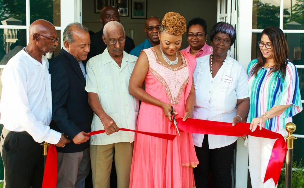 IT’S OPEN: Minister of Community Development, Culture and the Arts Dr Nyan Gadsby-Dolly cuts the ribbon to open Chickland’s new community centre in Freeport on Saturday. PHOTO BY CHEQUANA WHEELER