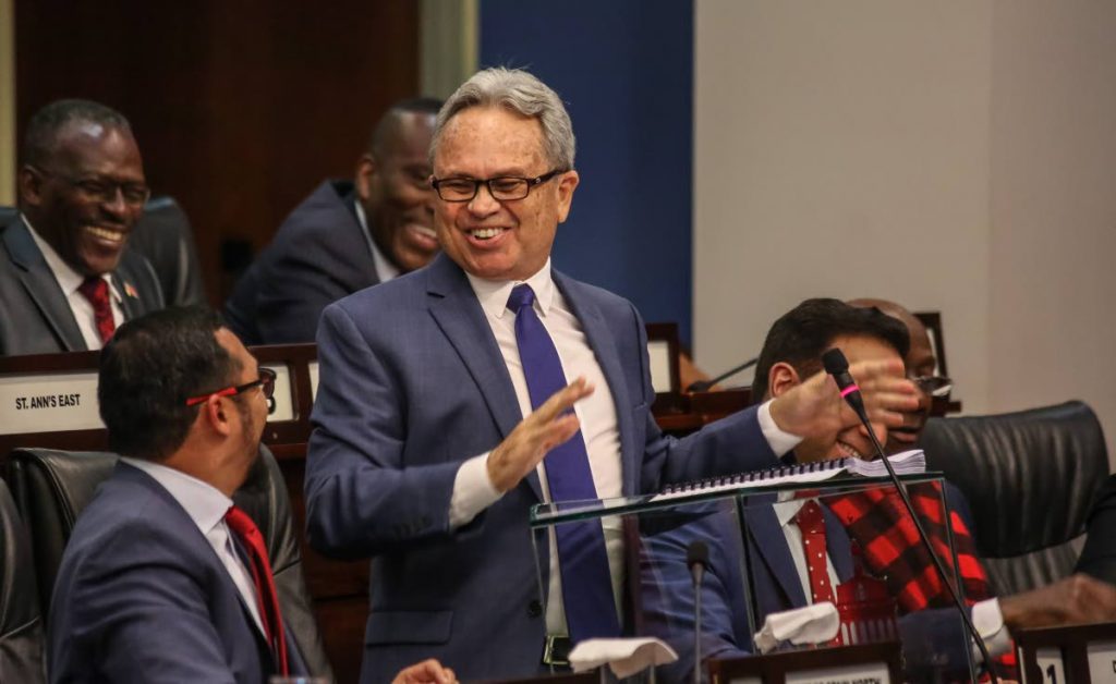Minister of Finance Colm Imbert smiles during his presentation of the National Budget,yesterday,in Parliament. 