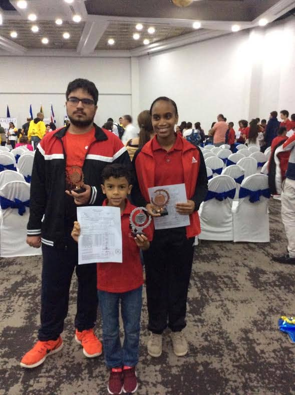 Team TTO medallists, Alan Safar Ramoutar, left, Kyan Muradali and Zara La Fleur, at the recently-concluded CAC Youth Chess Championships in Honduras. 