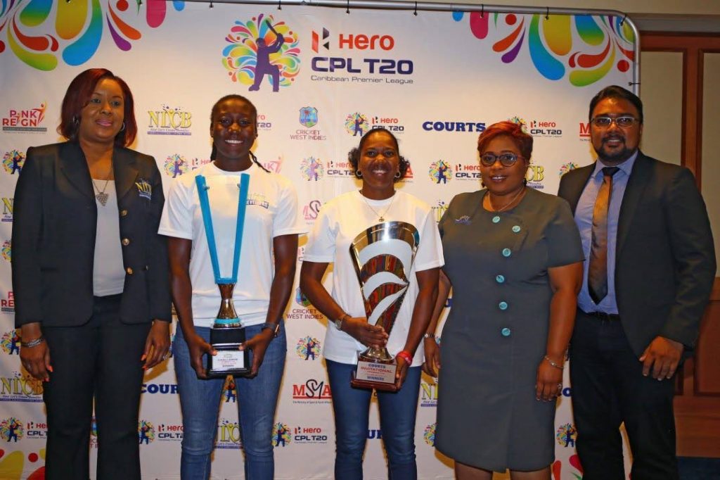 NLCB Revellers captain Stafanie Taylor, second from left, and Courts Gladiators captain Afy Fletcher, centre, at a press conference at Hilton Hotel, yesterday. Also in photo are marketing and public relations officer at NLCB Susan Worrell, from left, social responsibility officer at Courts Nicole Loney-Mills and corporate communications and public relations officer at Courts Fazad Mohammed.