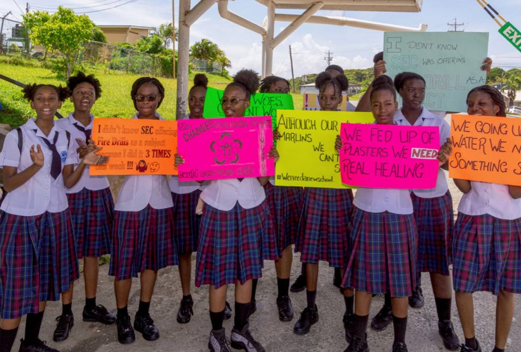 Students of Scarborough Seconday School protest for a safer school or to be moved to better environment on Thursday. - DAVID REID
