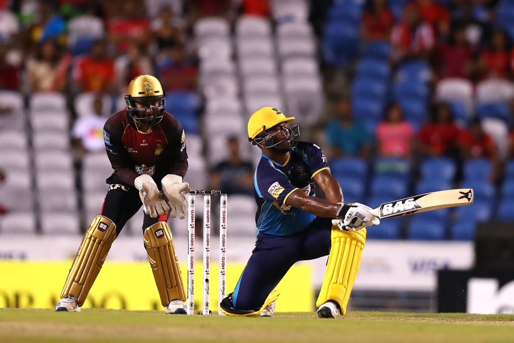 TAROUBA, TRINIDAD AND TOBAGO - OCTOBER 10: In this handout image provided by CPL T20, Johnson Charles of Barbados Tridents sweeps during the Hero Caribbean Premier League match between Trinbago Knight Riders and Barbados Tridents at Brian Lara Stadium on October 10, 2019 in Tarouba, Trinidad And Tobago. (Photo by Ashley Allen - CPL T20/Getty Images)