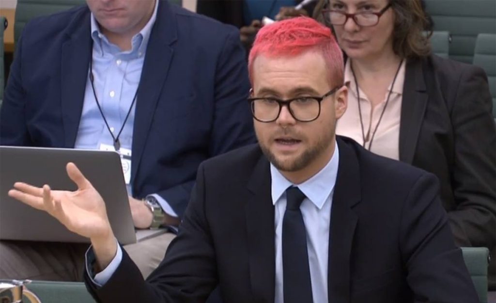 A video grab from footage broadcast by the UK Parliament's Parliamentary Recording Unit (PRU) shows Canadian data analytics expert Christopher Wylie, who worked at Cambridge Analytica, as a witness before the Digital, Culture, Media and Sport Committee of members of the British parliament at the Houses of Parliament in central London on March 27, 2018. AFP Photo - 