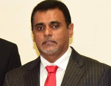 Works  and Transport Minister Rohan Sinanan. - 
