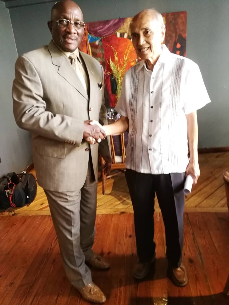 Fred Chin Lee, right, owner of the Hotel Normandie is seen in this file photo, taken earlier this year with NCC chairman, calypsonian Winston “Gypsy” Peters. Chin Lee died on Sunday at the age of 84.  - 