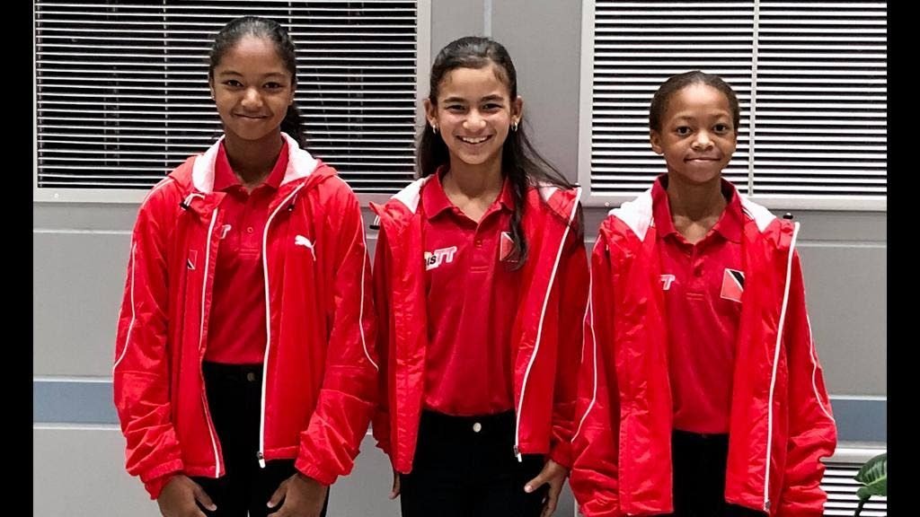 Cameron Wong, left to right, Jordane Dookie and Jaeda-Lee Daniel-Joseph at Piarco International Airport on their way to Bolivia for the 2019 Copa COSAT tournament, last month.  - 