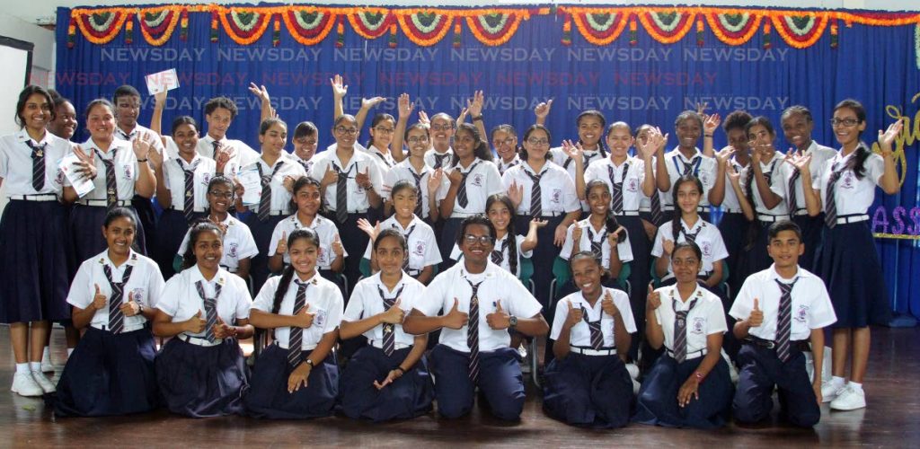 CELEBRATING SUCCESS: SWAHA Hindu College honour roll students celebrate at the school in Sangre Grande.    - ROGER JACOB