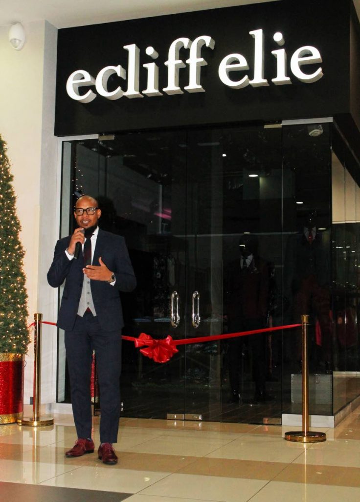 Fashion designer Ecliff Eli speaking at the opening of his new clothes store at C3 Mall in San Fernando. - 