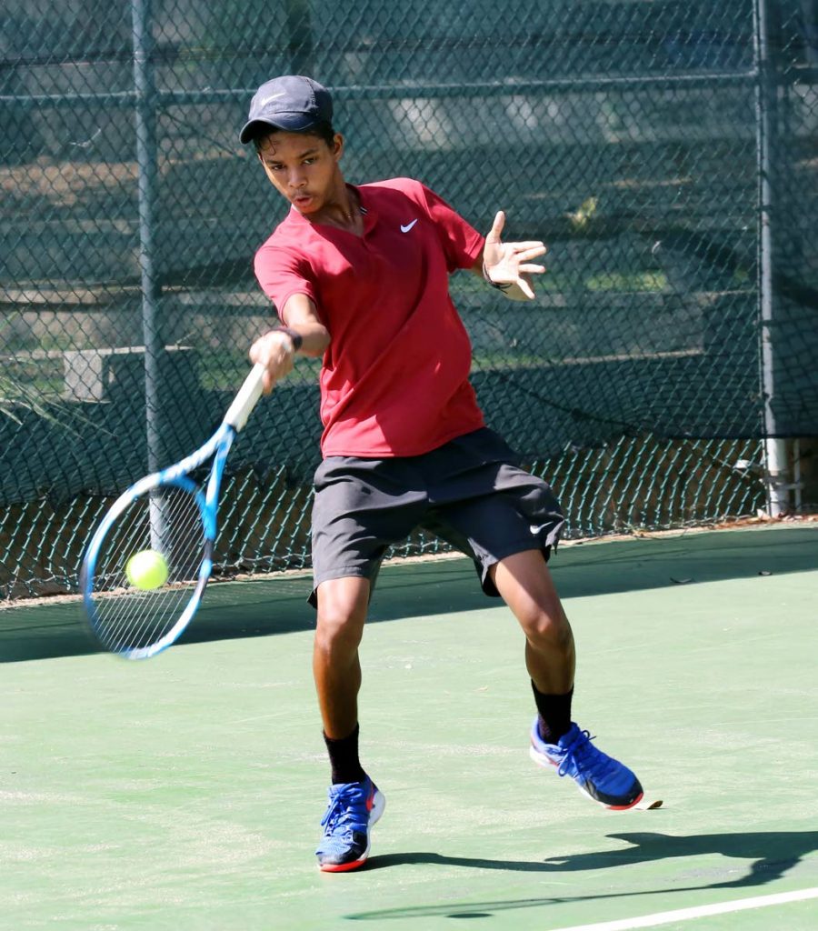 Ethan Wong during his match against Sebastien Sylvester yesterday. PHOTO BY SUREASH CHOLAI. - SUREASH CHOLAI