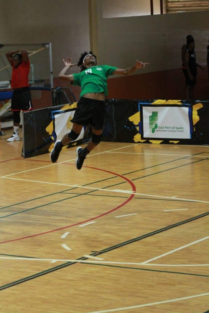 Joshua Persaud, of Zenith, serves off at the NLCB/ The Office of the Prime Minister TT Volleyball Federation Super League encounter against Central Warriors, over the weekend, at the Eastern Regional Indoor Arena, Tacarigua. - 