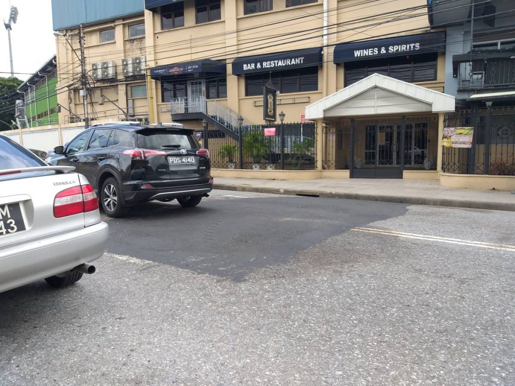 Smooth sailing! Drivers on Tragarete Road can no longer expect to be inconvenienced by a sinkhole which formed in early October. The issue was fixed over the weekend. - Tyrell Gittens