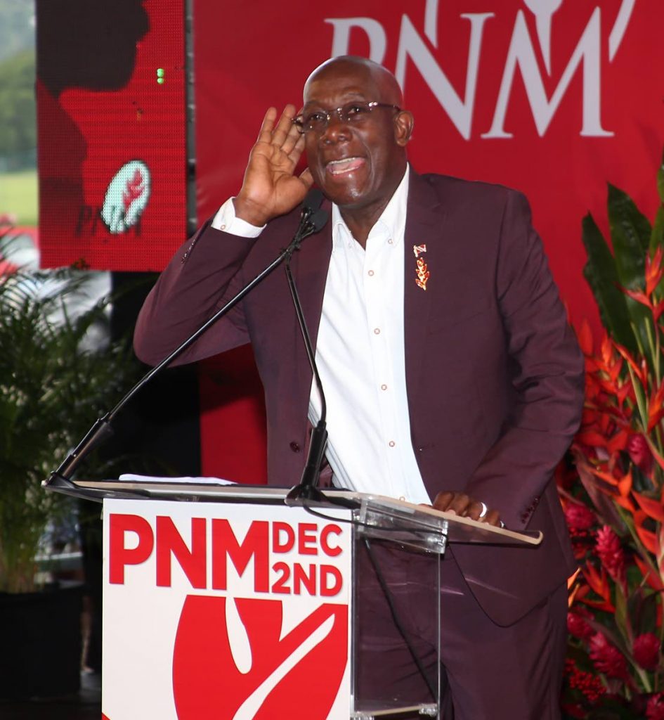 LET ME HEAR YOU: Prime Minister Dr Keith Rowley calls on the PNM faithful to chant “great is the PNM” during his speech yesterday at the Queen’s Park Savannah. PHOTO BY ANGELO MARCELLE - 