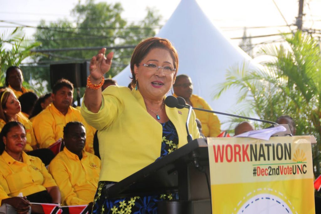 HEAR ME WELL: Opposition Leader Kamla Persad-Bissessar speaks yesterday at the UNC’s launch of its local govt election campaign and presentation of candidates in Couva.  - MARVIN HAMILTON