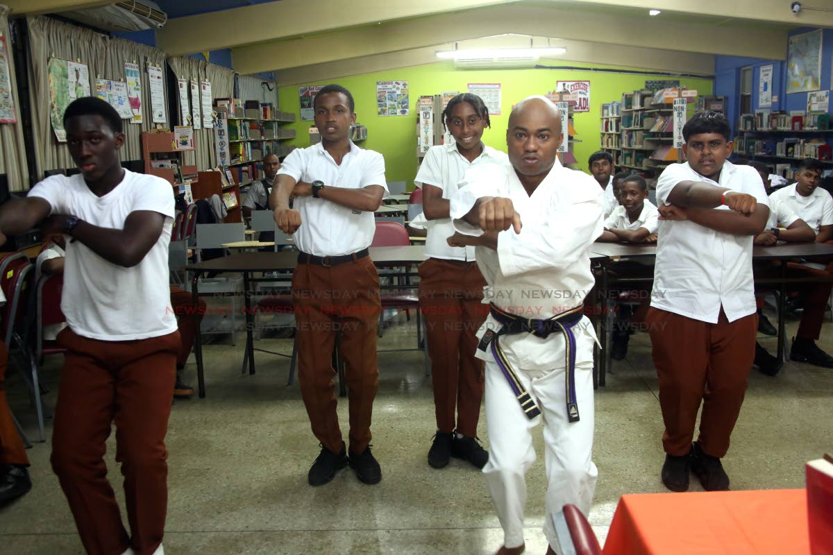 Karate cop helps Enterprise youths - Trinidad News