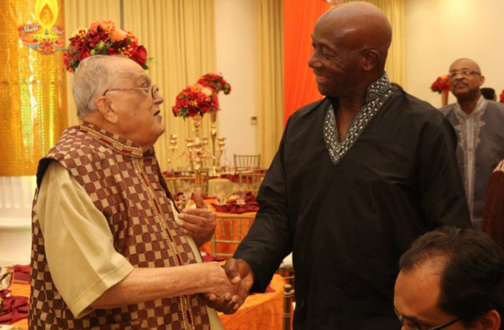  Prime Minster Dr Keith Rowley greets Maha Sabha secretary general Satnarayan Maharaj at a Divali function hosted by the Office of the Prime Minister. FILE PHOTO - 