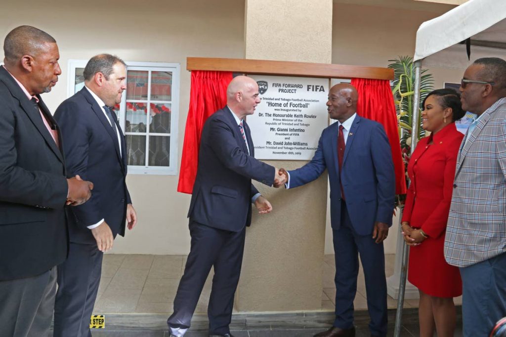 From Left: TTFA president David John-Williams, Concacaf president Victor Montagliani, FIFA president Gianni Infantino, Prime Minister Dr Keith Rowley, Minister of Sport and Youth Affairs Honourable Shamfa Cudjoe and deputy speaker Esmond Forde unveils the plaque for the The Home of Football in Couva. - Marvin Hamilton