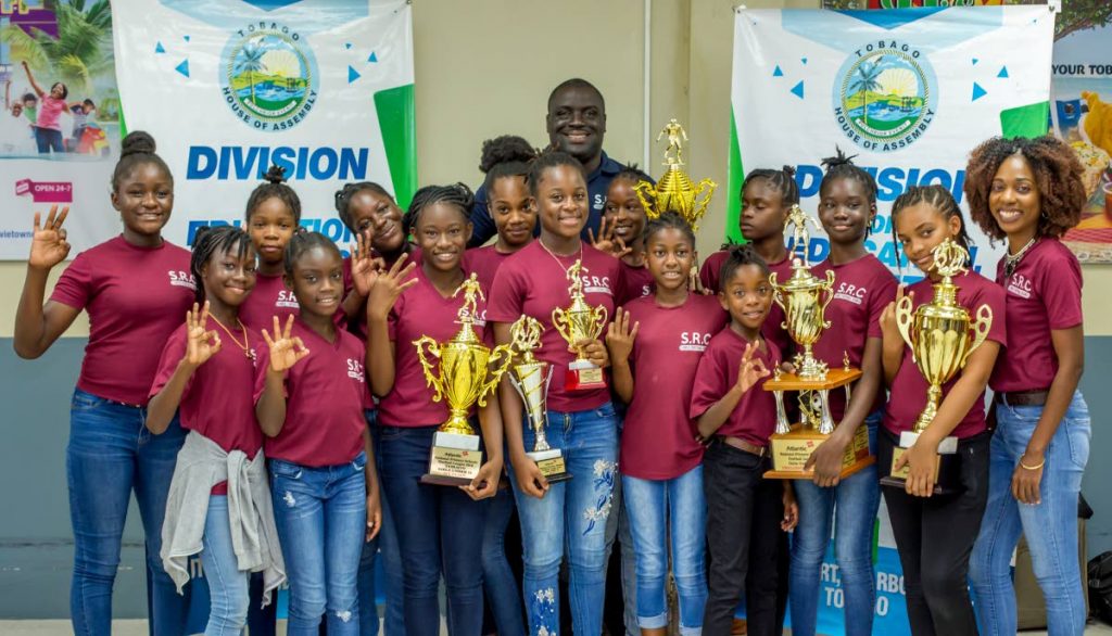 Scarborough RC Primary School footballers return home after winning the Atlantic National Primary School under-15 girls title on Wednesday.  - THA 