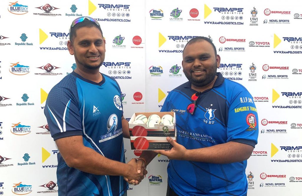 Zaheer Lall (left) Technical Director at Novel Sports presents Committee Member Shane Maharaj with the official balls for the Ramps Logistics Super Series Invitational T20 tournament. - 