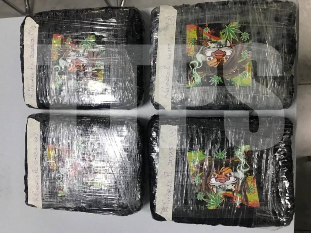 Police found four blocks of compressed marijuana weighing 2.152 kilogrammes in a car in Sea Lots on Friday. Two men have been charged. - Photo courtesy the TTPS