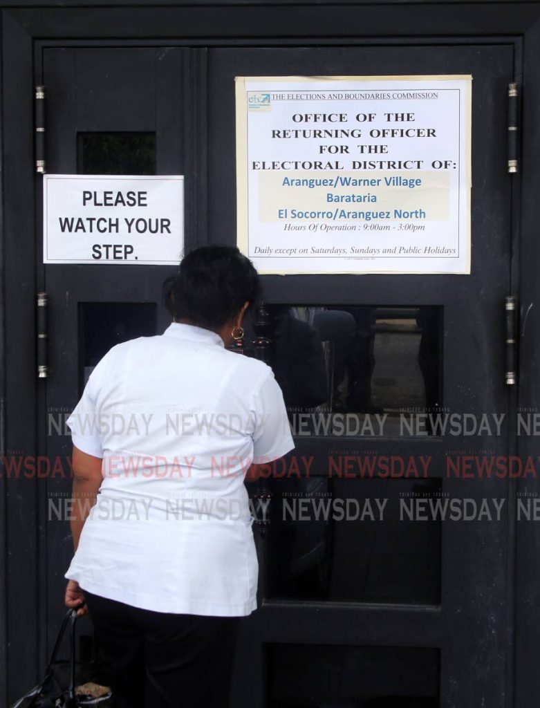 A nurse who is a special elector enters the EBC office on Fifth Street, Barataria, on Monday to cast her vote ahead of next week's local government elections. - SUREASH CHOLAI