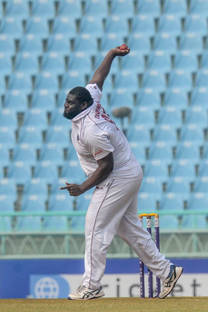West Indies' Rahkeem Cornwall bowls during the Test match between Afghanistan and West Indies at the Ekana Cricket Stadium in Lucknow, on Wednesday. - (AFP PHOTO)