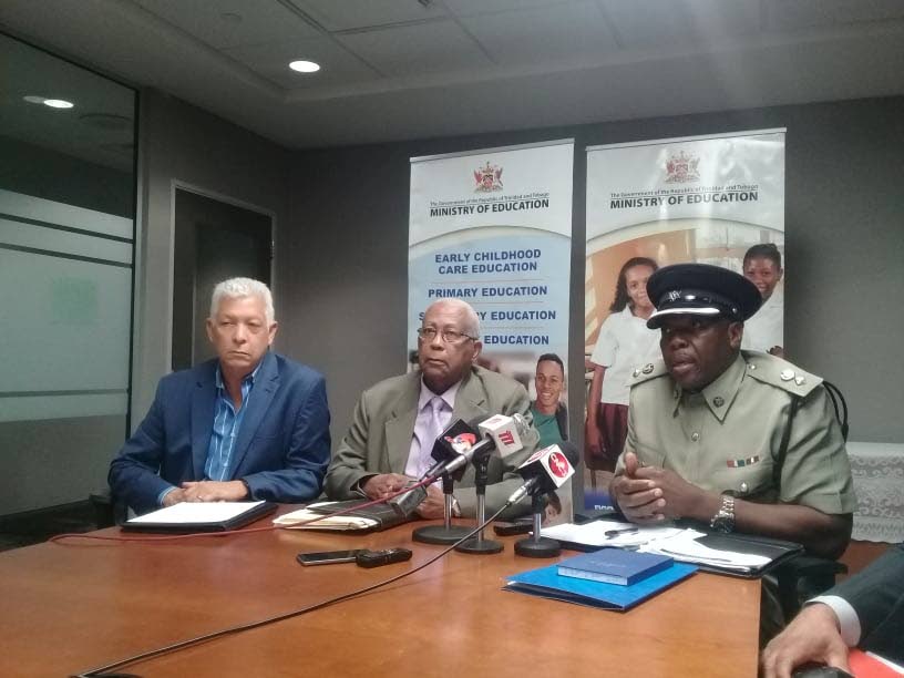 Port of Spain Mayor Joel Martinez. left, Education Minister Anthony Garcia and DCP Anthony James, respond to questions from reporters during a press conference at Education Towers, St Vincent Street, Port of Spain on Friday.  - Shane Superville