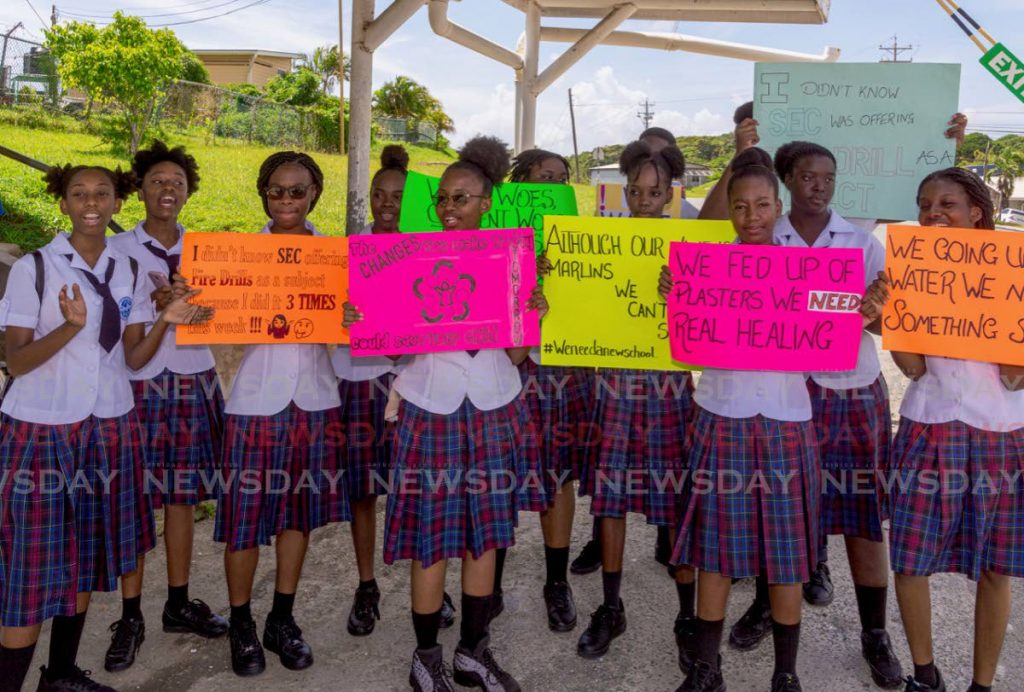 Students of Scarborough Seconday School protest for a safer school or to be relocated in a demonstration in October this year. PHOTO BY DAVID REID. - DAVID REID
