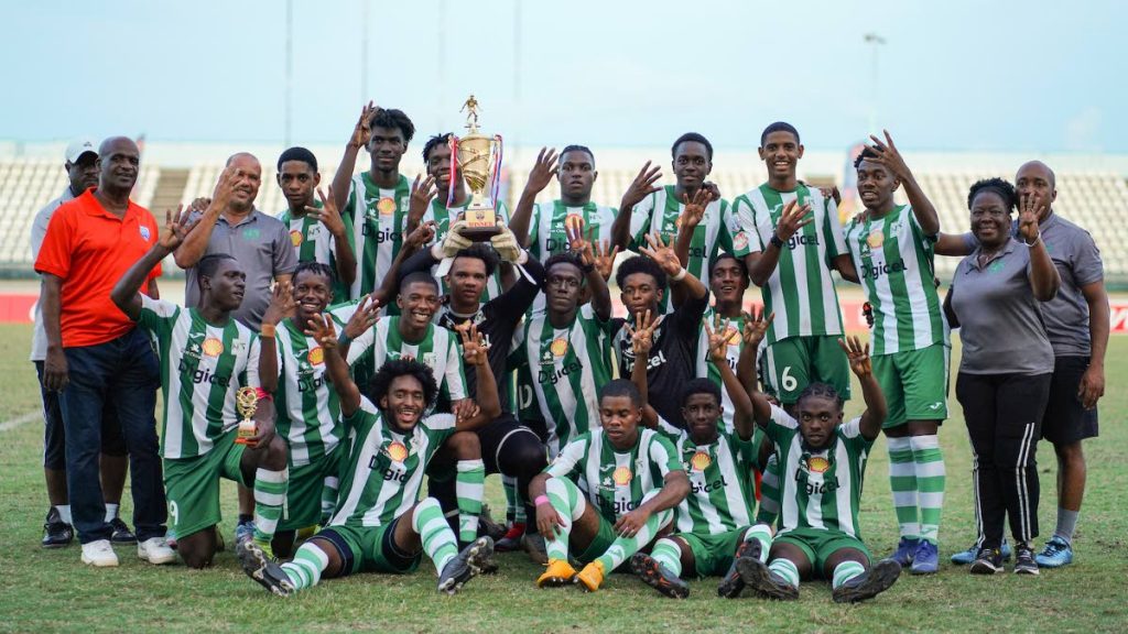East Zone Intercol Champions San Juan North players and staff dsiplay the winners trophy after beating St Augustine 3-1 in the Coca Cola Intercol East Zone final, on Nov 21, at Larry Gomes Stadium, Malabar. -  Daniel Prentice/CA-images