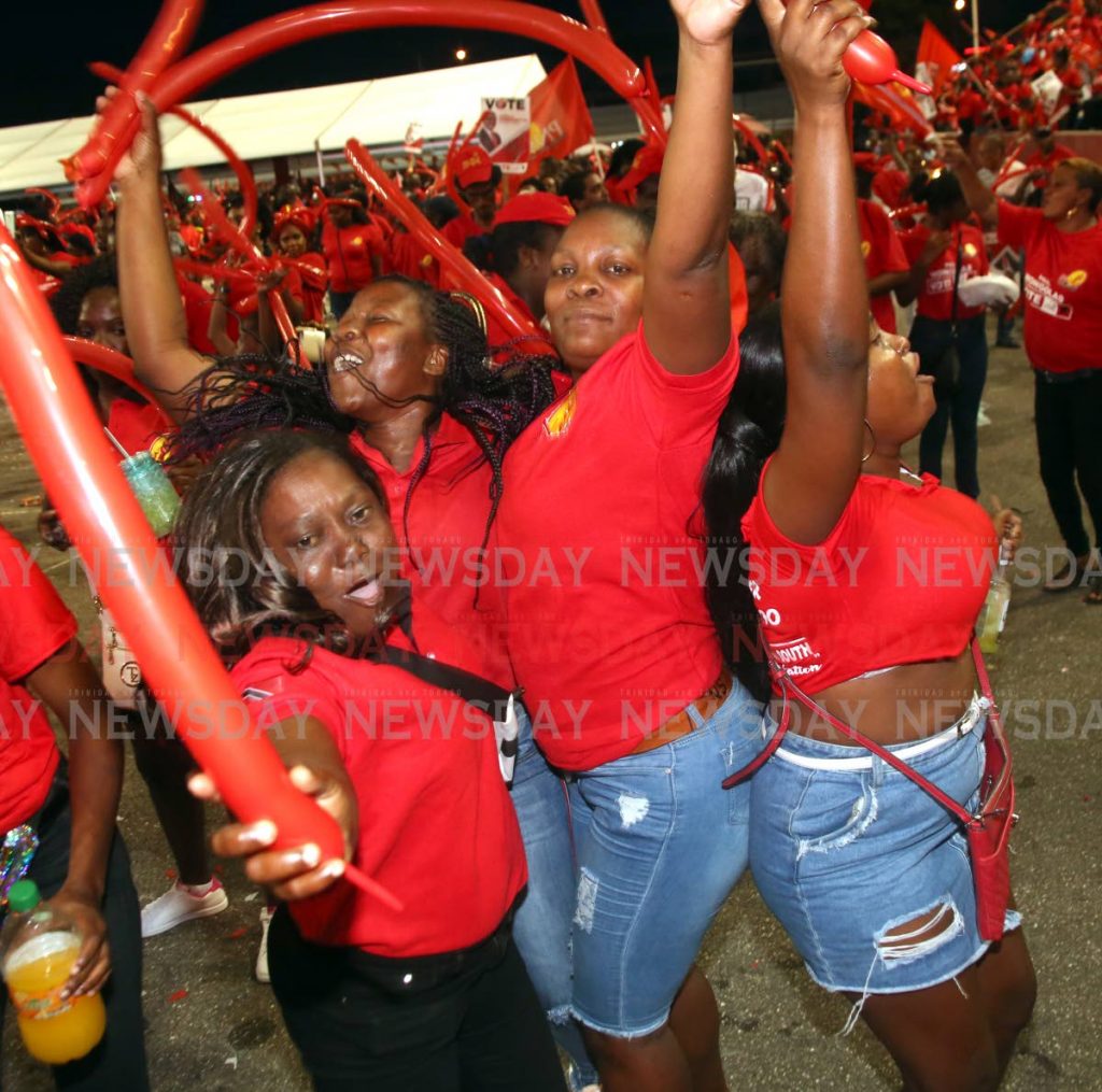 Supporters party at the PNM's closing local government election rally at Jean Pierre Complex, Port of Spain on Saturday. - SUREASH CHOLAI