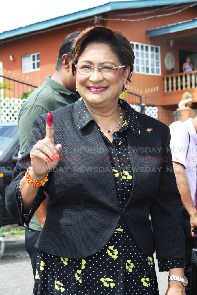 Opposition leader Kamla Persad-Bissessar cast her vote at Hermitage Presbyterian school in the local government elections.  - Lincoln Holder