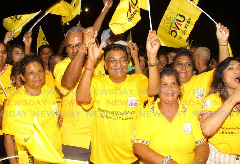 UNC supporters celebrate after local government elections at the Couva Multi-purpose Facility. - ROGER JACOB
