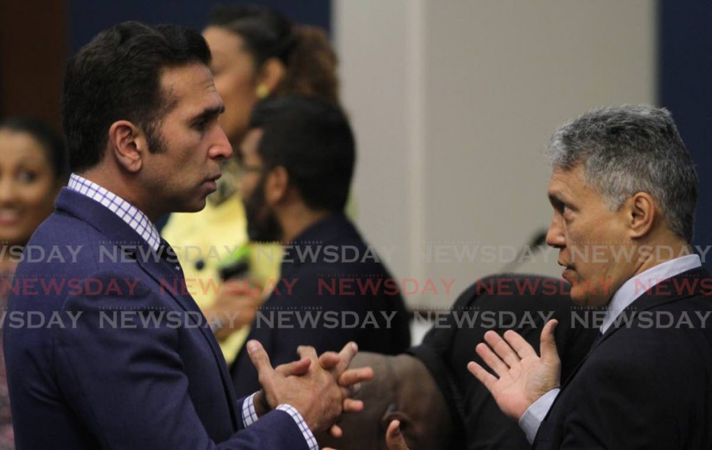 Independent Senator Anthony Vieira, right, makes a point to Attorney General Faris Al-Rawi during a recent sitting of the Senate.  - Ayanna Kinsale