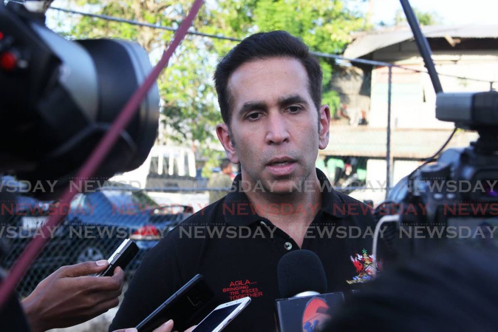 Attorney General Faris Al-Rawi speaks to the media during in Bayshore Marabella on December 9. On Saturday, Al-Rawi denied any link to a cannabis company set up his wife’s niece and her husband. - Lincoln Holder