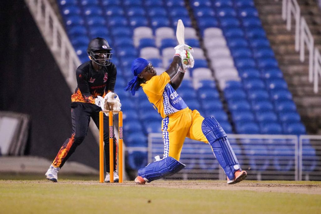  Titans' Deandra Dottin swings away after slapping the ball for six during match day five, of the Courts Grand Slam T20 match againstTrident Sports Phoenix, at the Brian Lara Cricket Academy, Tarouba.  - Daniel Prentice/CA-images