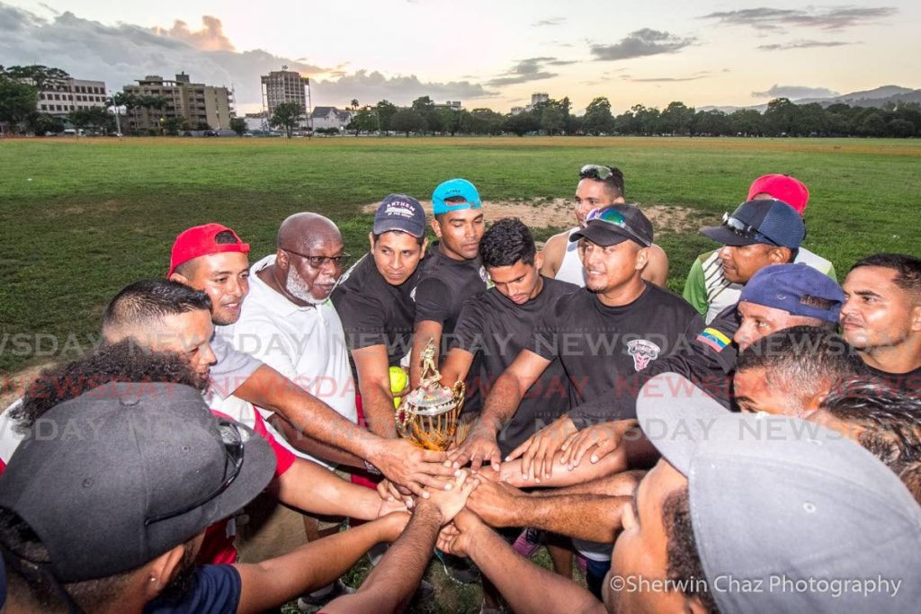 The Beasts of San Fernando celebrated with the champion trophy after winning the fifth TT Softball Championship at the Queen's Park Savannah in Port of Spain. - Grevic Alvarado