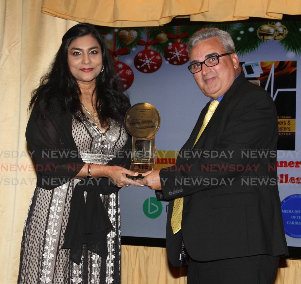 Bernard Pantin receives a TTPBA award from it's President, Kiran Maharaj, at the assocoaition 15th Annual Dinner & Awards for MEdia Excellence, last Thursday night at Hilton Hotel, St. Anns.  - ANGELO_MARCELLE
