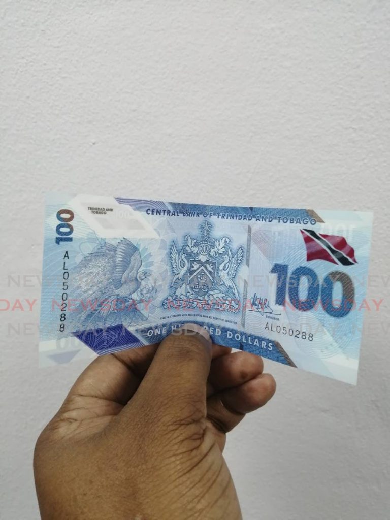 The new polymer $100 bill. PHOTO BY KEINO SWAMBER - KEINO SWAMBER