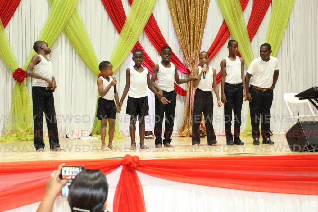 The boys get ready to perform a drama  piece with music. 

 - 