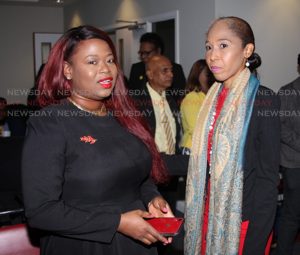 PNM alderman Stacy Mc Sween who was sworn in at the Chaguanas Borough corporation on Tuesday chat with PNM councillor for Edinburgh/Longdenville Janelle Joe-Ryan at the swearing in ceremony.
Photo by Lincoln Holder