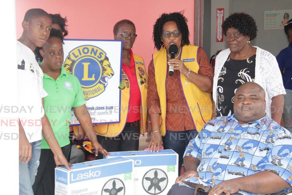 The Scarborough Upper Lions Club donated two fans to the Technical Vocation Centre for Persons with Disability.  - THA