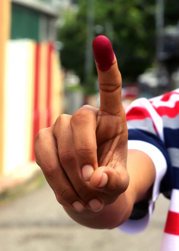 STAIN FINGER AFTER VOTING ... STOCK PHOTO    PHOTO SUREASH CHOLAI