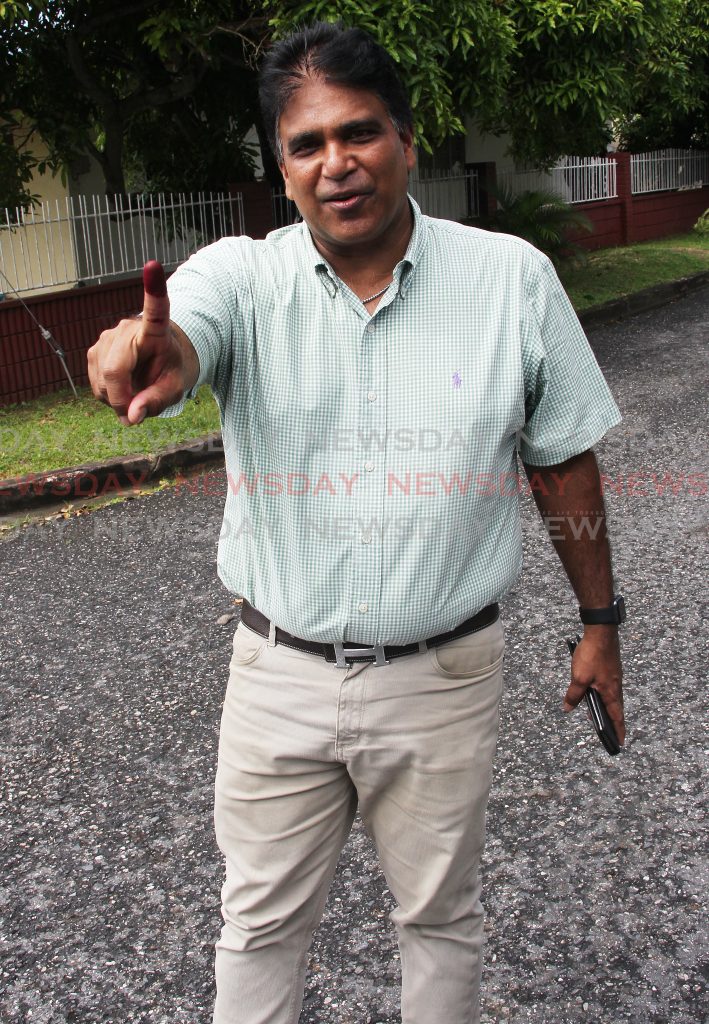 Dr Roodal Moonilal show off his voting finger after he voted at the Gulf View community centre  in the Local Government elections 


Holder             2-12-19