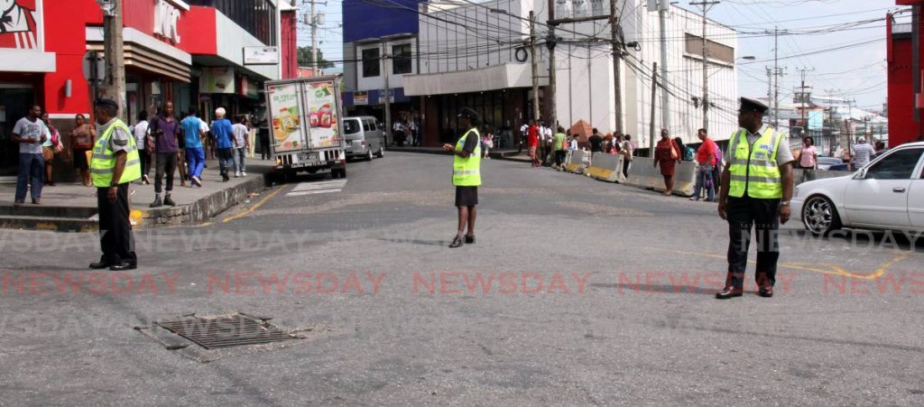 File photo: Police officers at Library Corner, San Fernando.