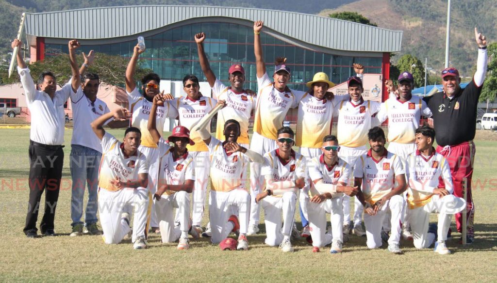 In this Feb 26,2019 file photo, the Hillview College cricket team, including coach Richard Kelly,right, celebrate after winning the SSCL premiership division title against  Shiva Boys’ Hindu College, at the Sir Frank Worrell Ground, St Augustine. Hillview won the match by 117-runs. At left, Hillview’s principal Leslie Mahase joins in the celebrations. - AYANNA KINSALE