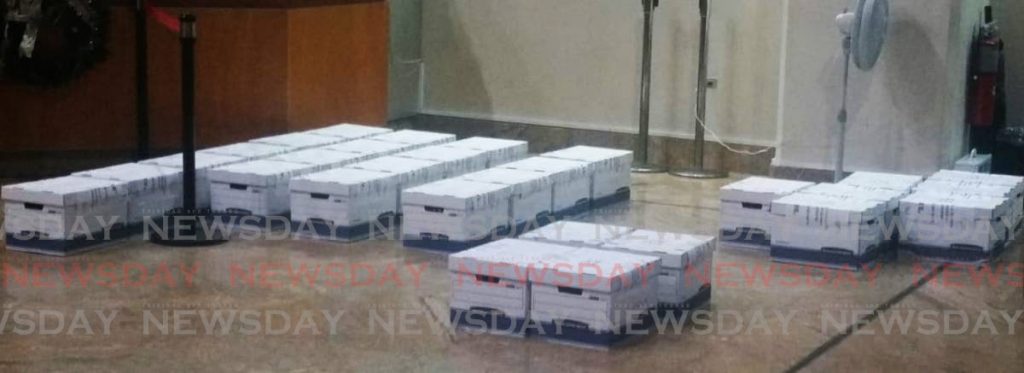 Boxes containing $28 million in paper $100 notes seized from pastor Vinworth Dayal on December 31.  - 