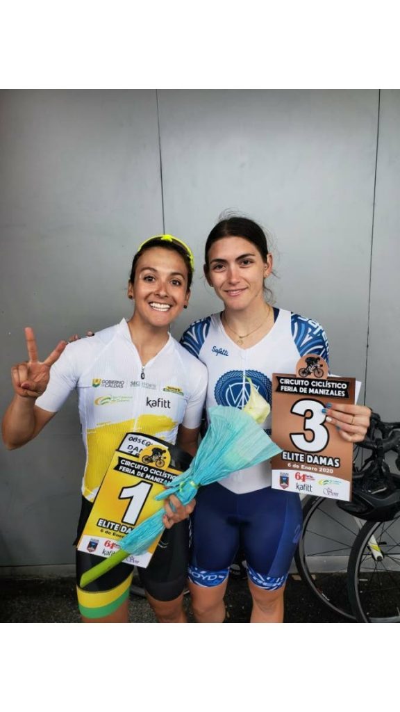 TT's Alexi Costa, right, celebrates her third place finish at the Feria de Manizales Cycling Circuit in Colombia on Monday. At left is gold medallist, Diana Carolina, of Colombia.  - Photo courtesy Alexi Costa