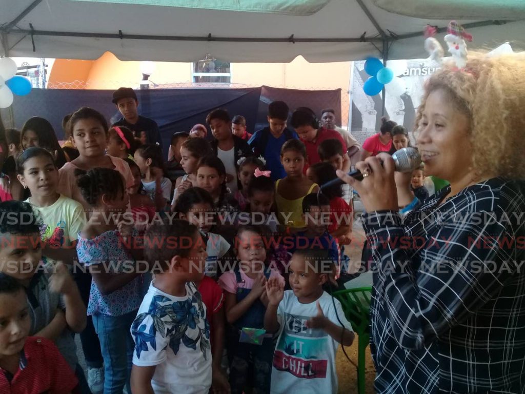 More than 100 Venezuelan children received gifts during the celebration of the Magi at the Hispanic Cultural Centre, Arima, on January 6. - Grevic Alvarado