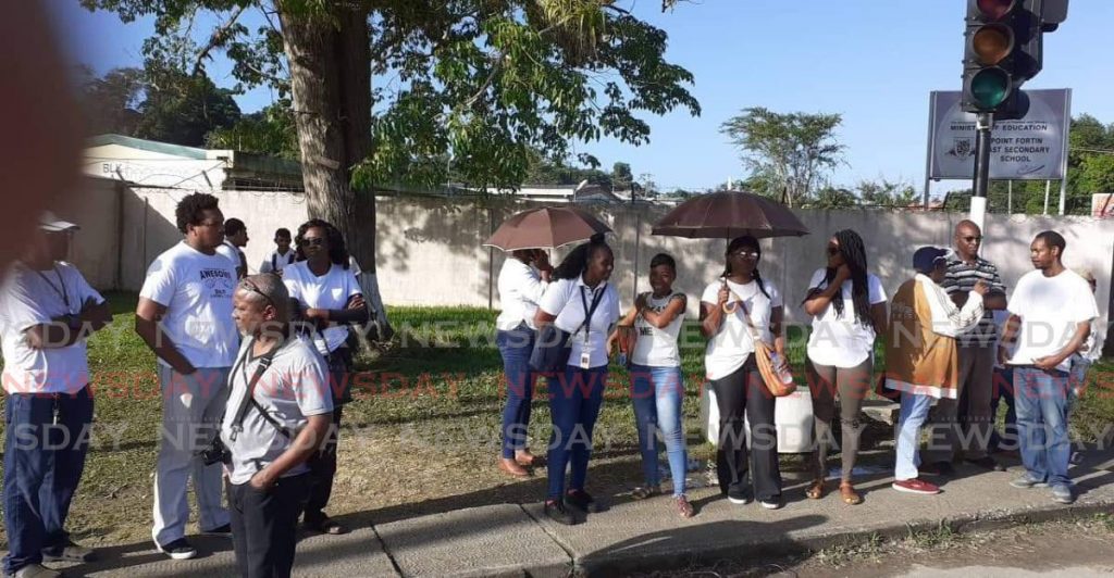 PTA protesting outside the Point Fortin  East secondary school  - 